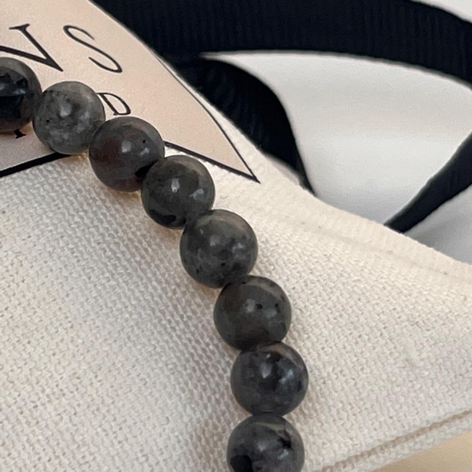 Close-up of stellar yooperlite stone beads bracelet for men

