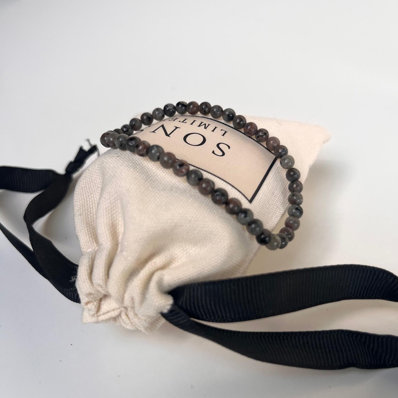 Close-up of stellar stone beads bracelet for men